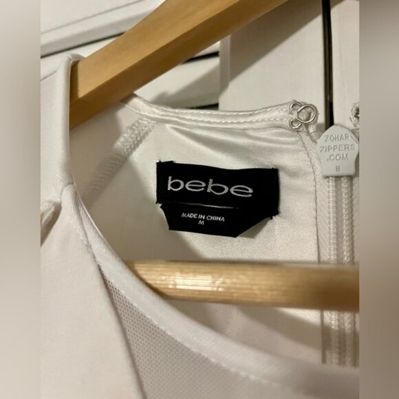 NWOT bebe Black and White Long-Sleeved Knee-Length Dress with Gold Chain Accent - Picture 6 of 8